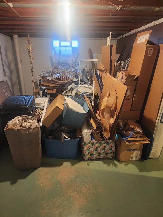 Roll-off dumpster container at job site for 15 Yard Dumpster Rental in Ball